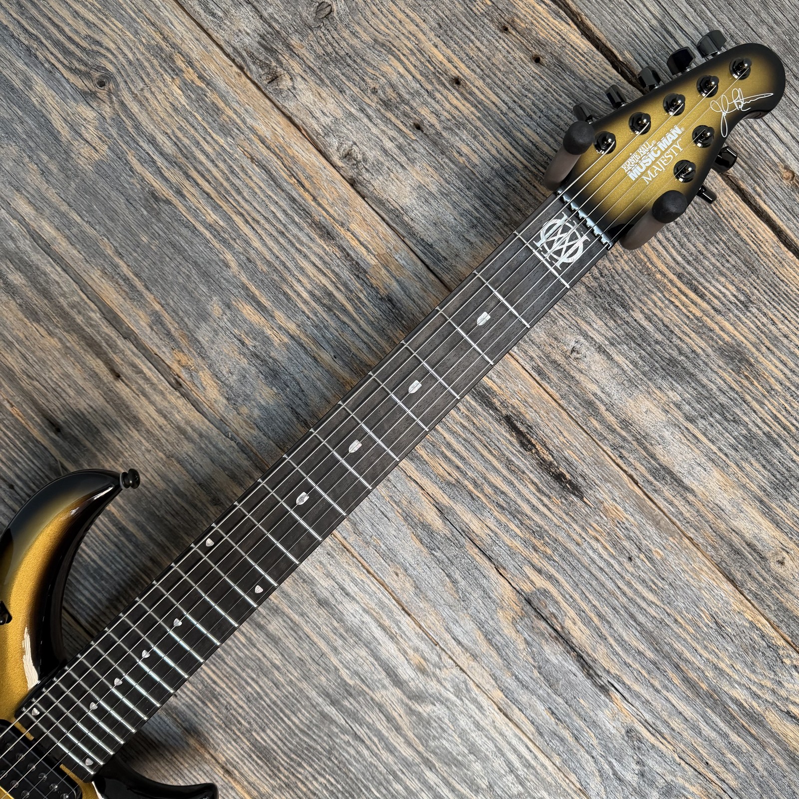 Ernie Ball Music Man Majesty 7 7-String Electric Guitar – Gold Eclipse