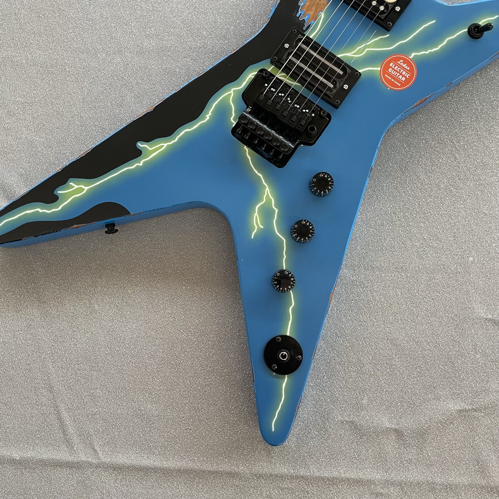 Aged Electric Guitar Tremolo H-H Pickups Blue Finish Black HW Lightning Pattern