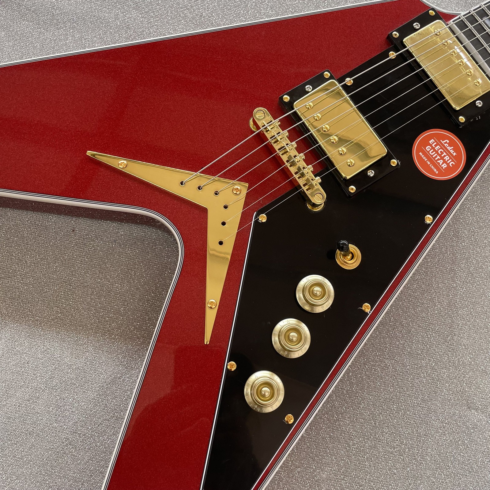 Unique metallic red V Electric Guitar Mahogany Body with pickguard free ship