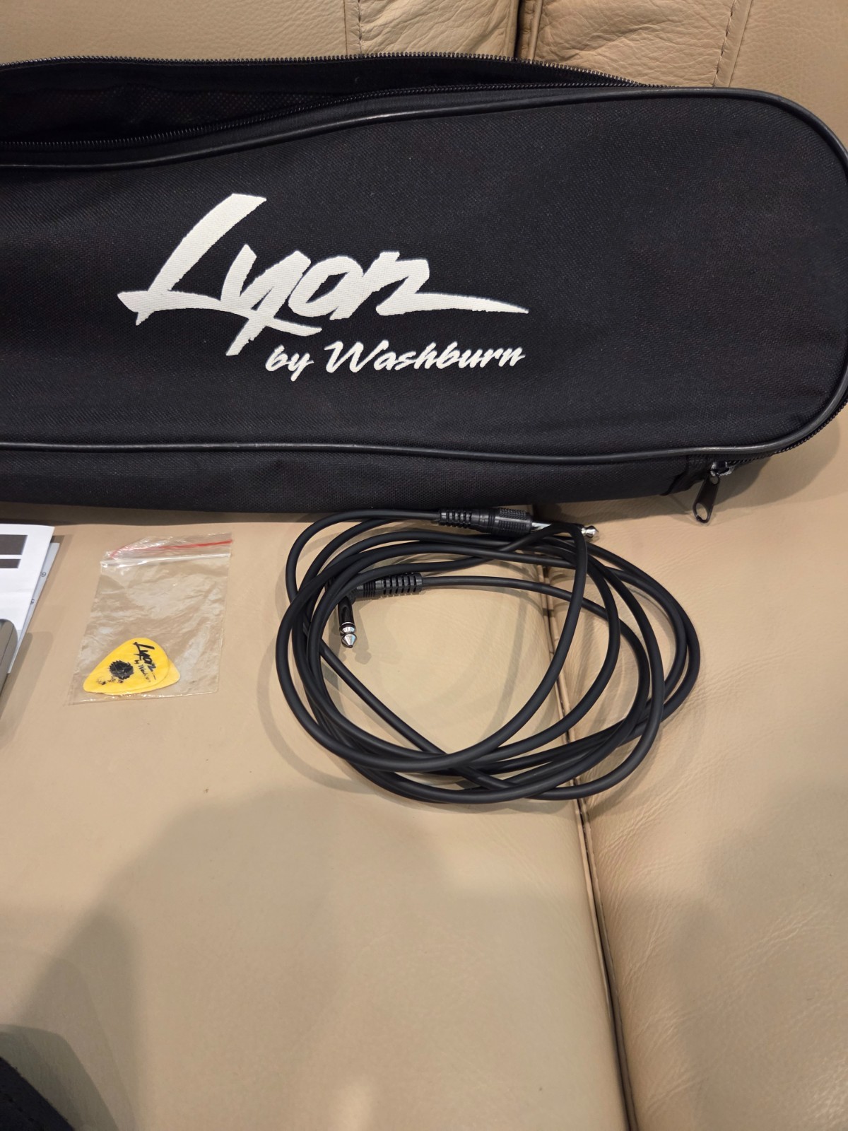 Washburn Lyon Electric Guitar gloss black finish included is gig bag & hardware.