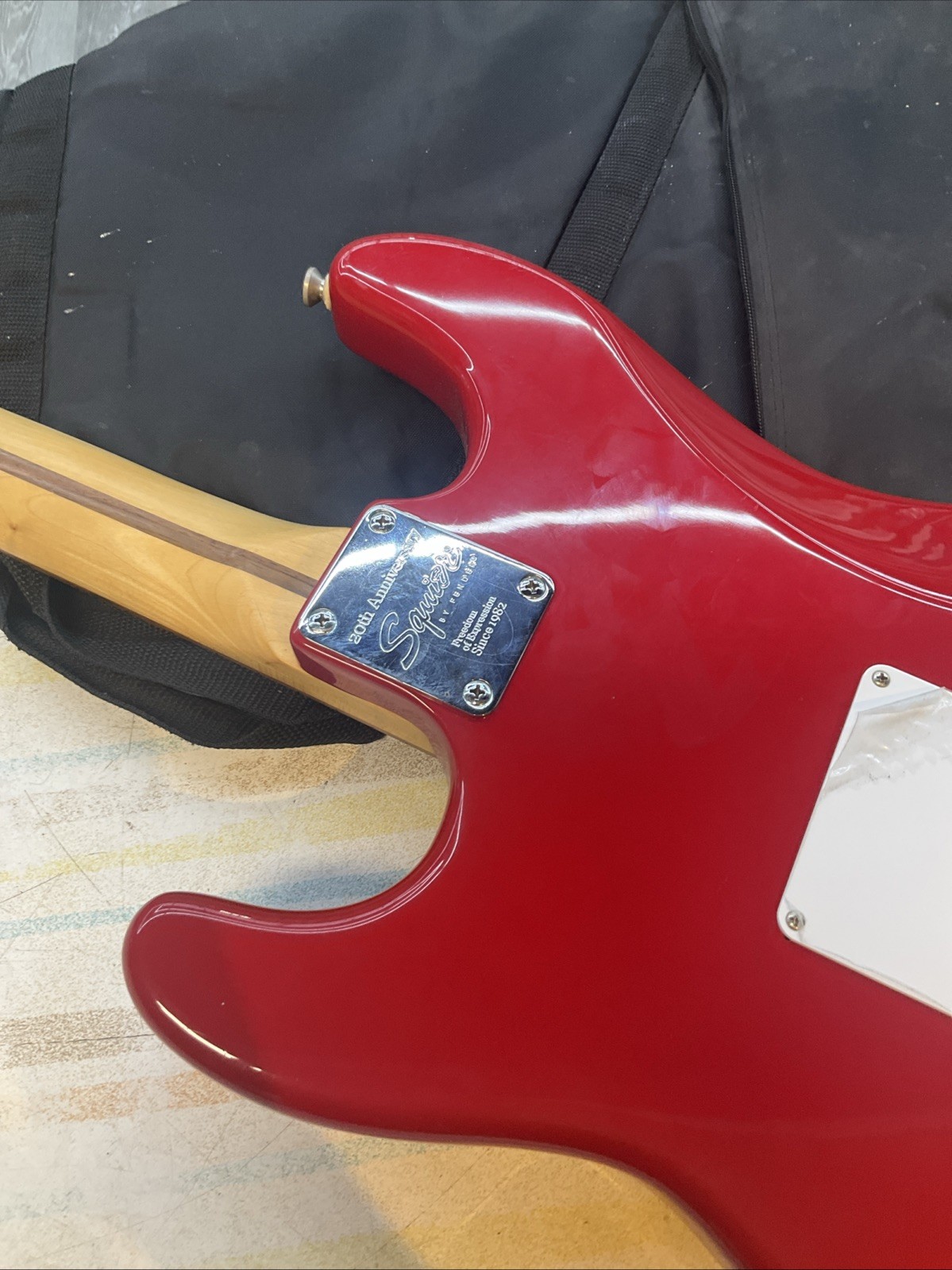 FENDER SQUIER STRAT RED WITH CUSTOM FLORAL 70S DESIGN AND GIG BAG ￼