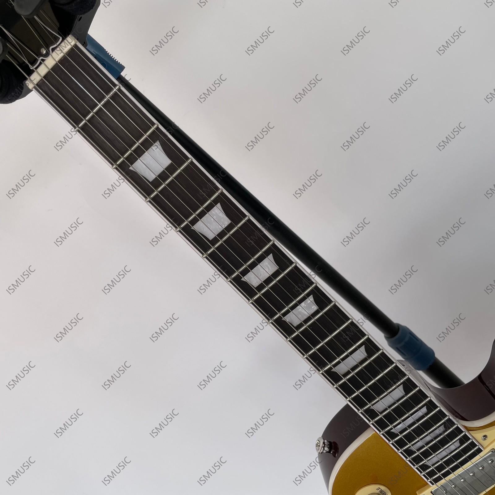 Solid Body Electric Guitar Stainless Steel Rounded Frets HH Pickups Metal Gold