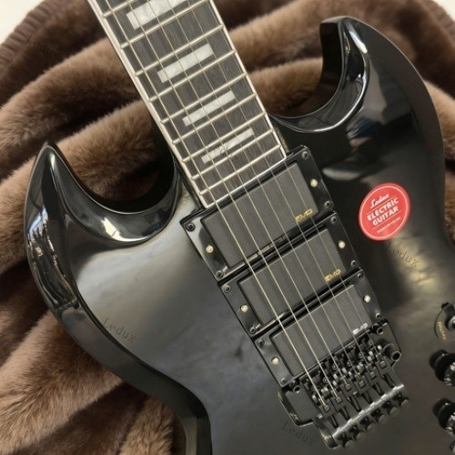 electric guitar black tremolo bridge HHH pickups rosewood fretboard lock nut