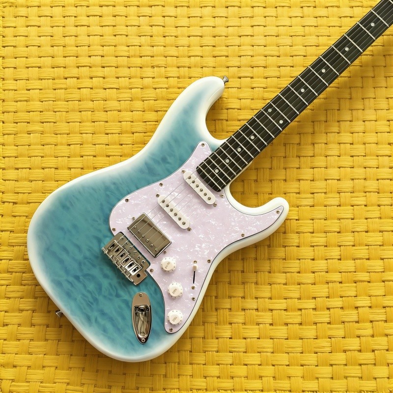 electric guitar blue quilted maple top tremolo bridge rosewood fretboard