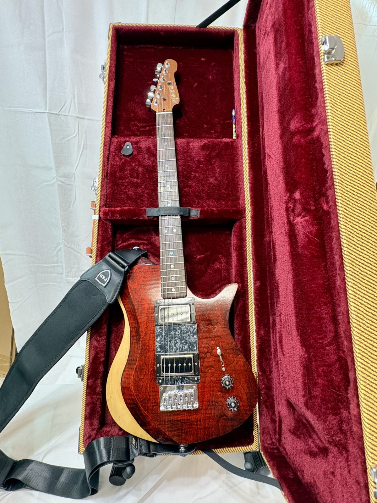 New red electric guitar with hard case, luthier made