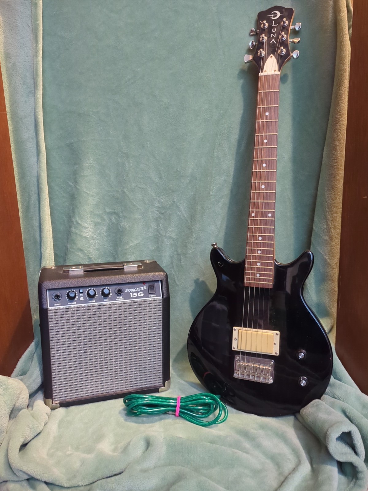 A Black Luna Electric Guitar 6 String Solid Body HPL Fretboard