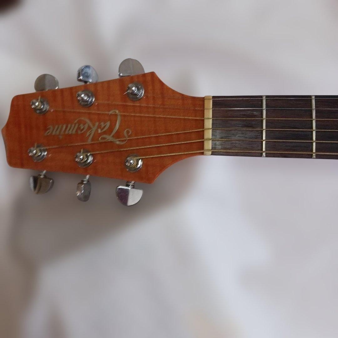 Takamine EF 350 MHC export model. Comes with electric acoustic case.