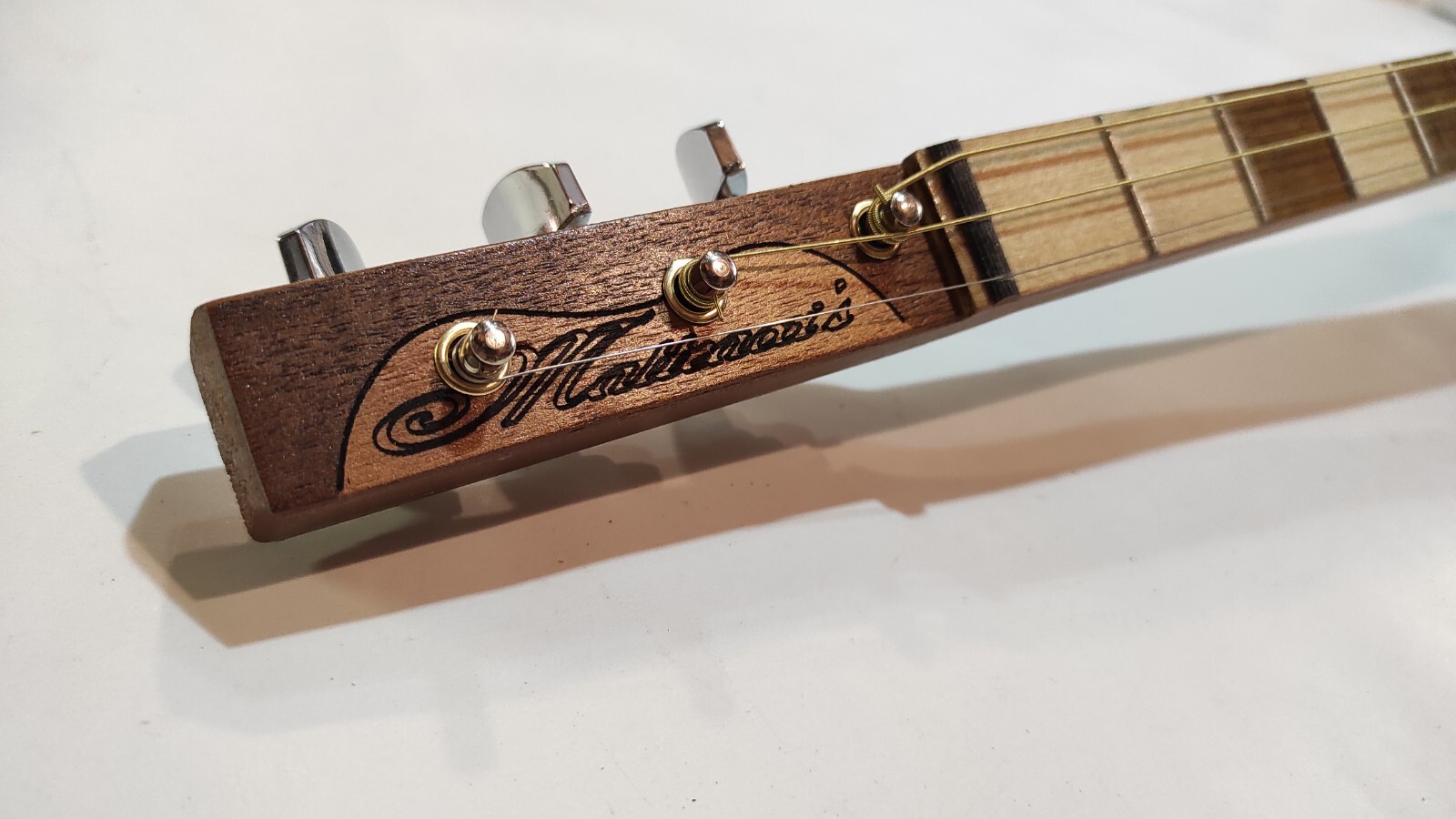 Tin can Gasoline Mancina left handed cigar box guitar Matteacci’s