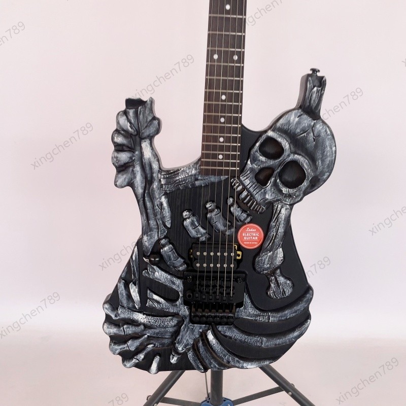 Left Hand Skull Solid Electric Guitar Rounded Fret Edge Maple Neck Hard Rock
