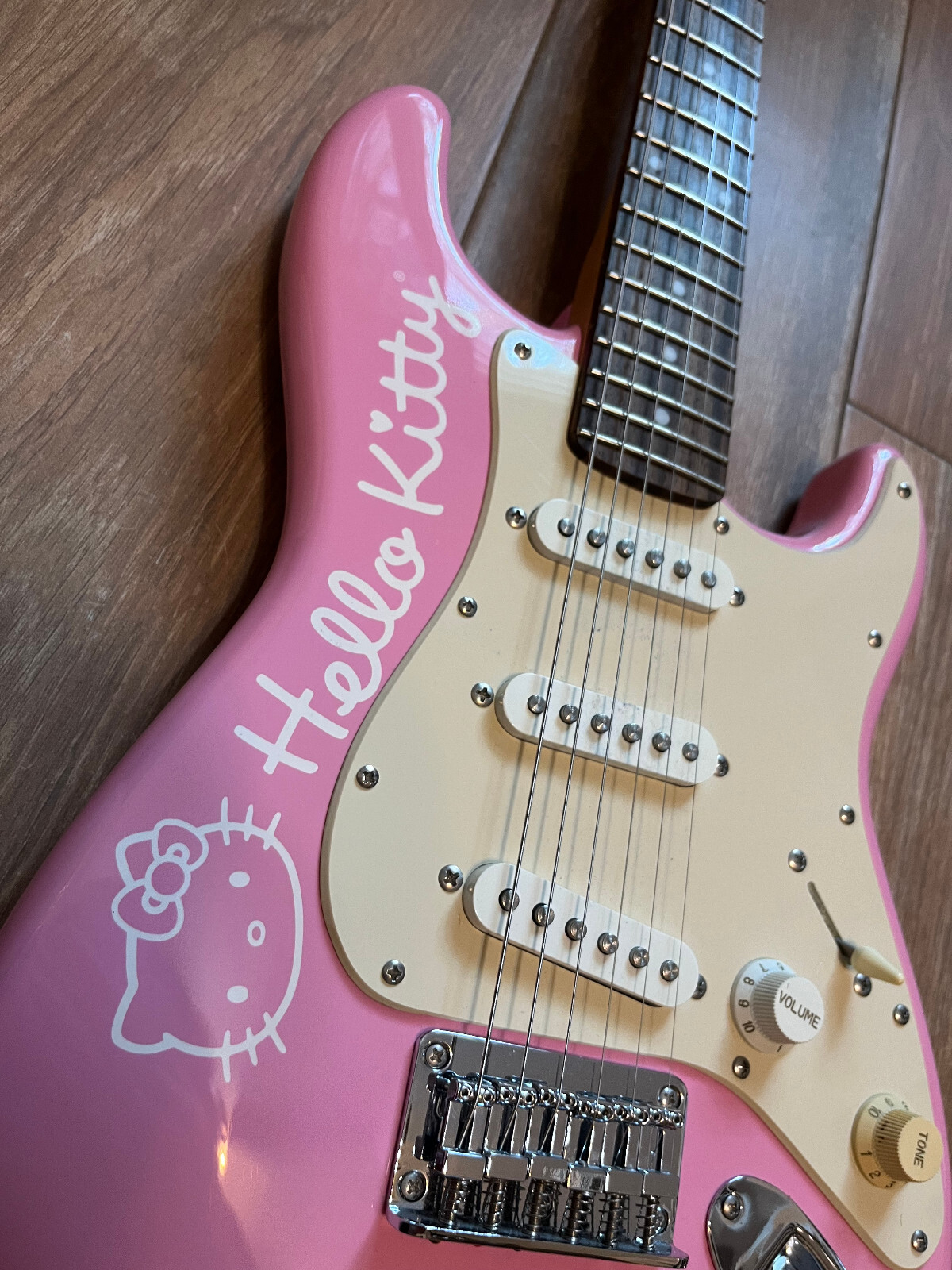 Hello Kitty Pink Squier mini guitar by Fender