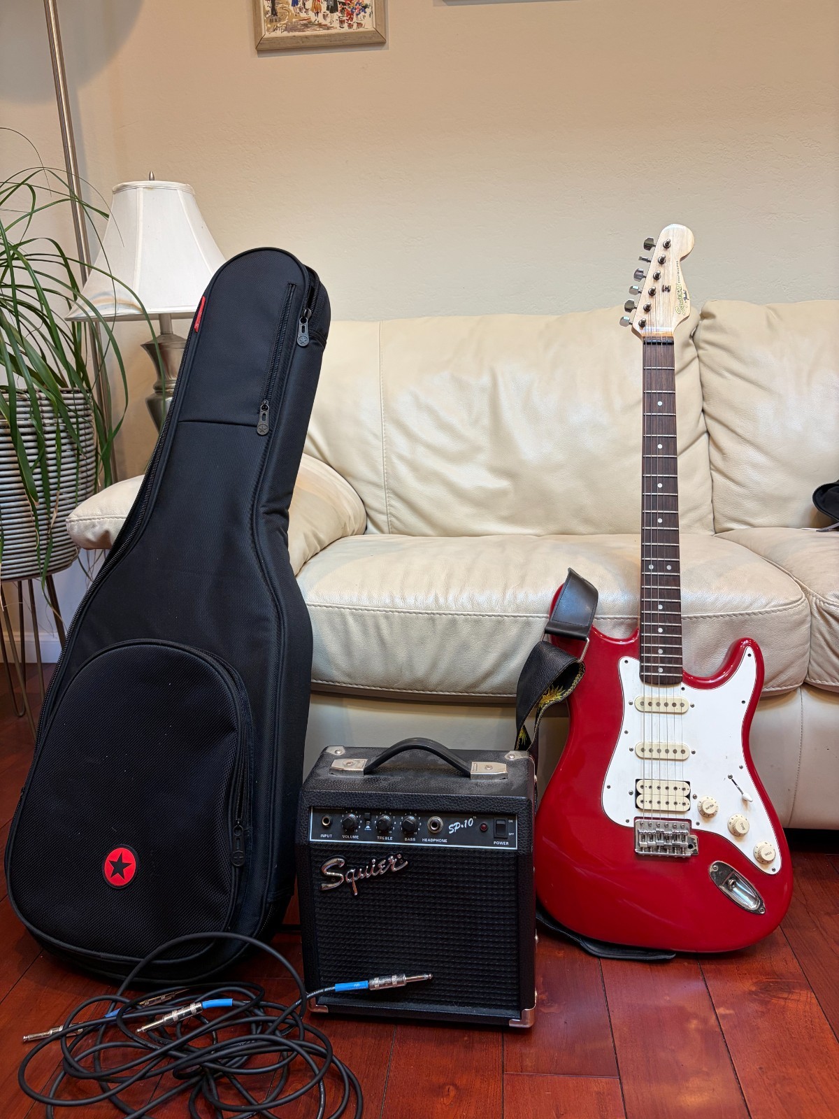 Fender Stratocaster Squier With Amplifier, Case, Cables, Strap, and Picks