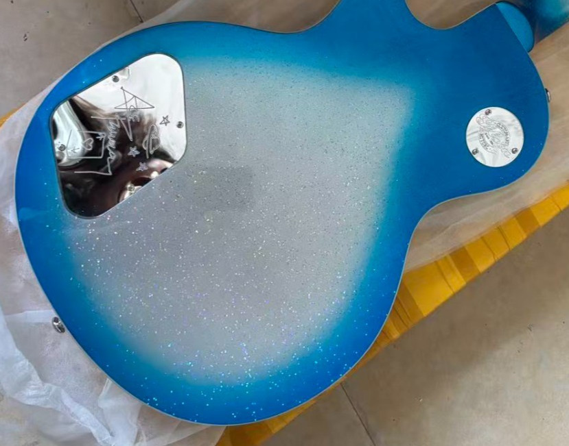 Customized blue lightning guitar with rosewood paperboard. Free shipping.