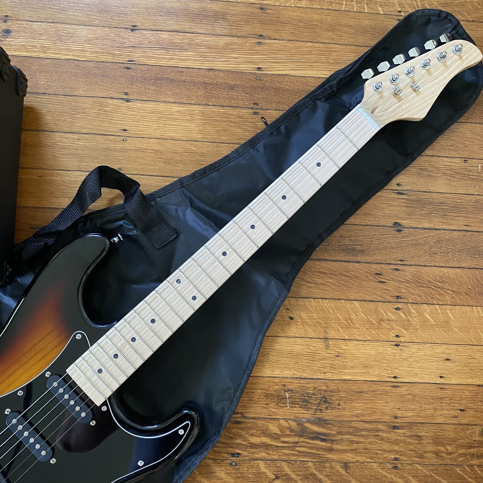 Full-Size Sunburst Electric Guitar Starter Package with 20-watt Amp, and More