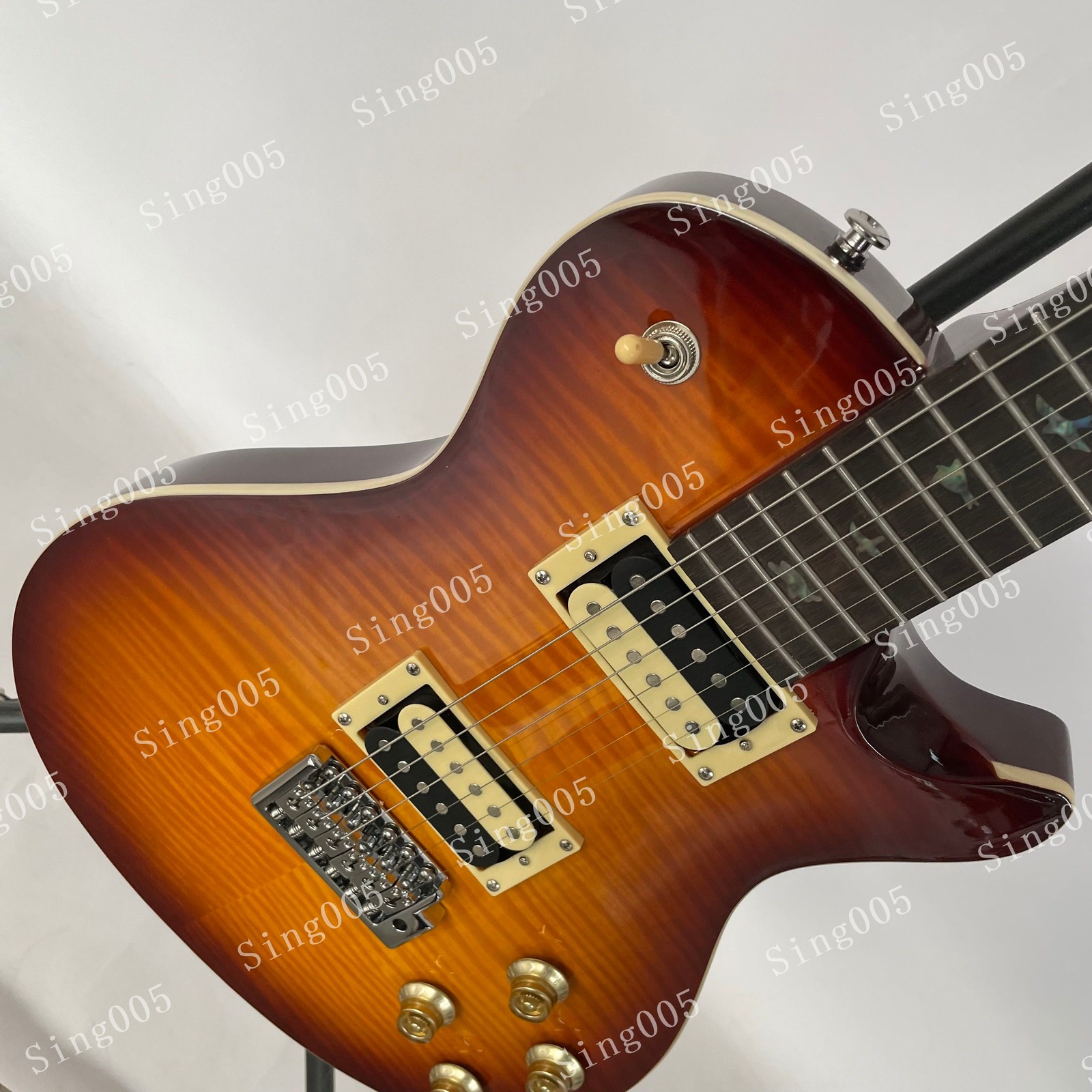 Hot Sale Electric Guitar Flamed Maple Top Bird Inlay Chrome Hardware Tremolo