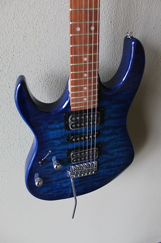 Brand New Ibanez Gio GRX70QAL Left Handed Electric Guitar – Transparent Blue