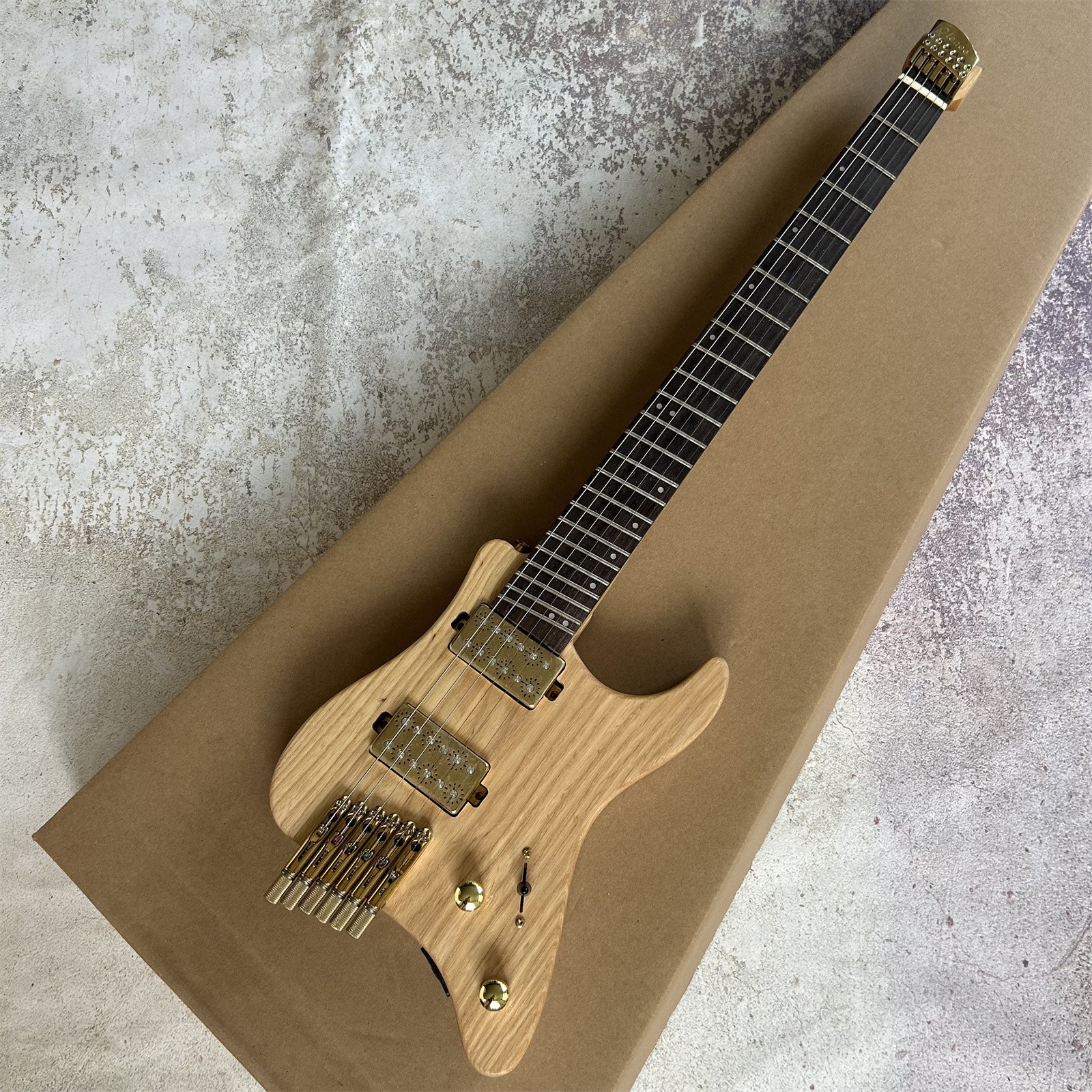 Portable Headless High End Solid Body Log Color Electric Guitar 24 Frets