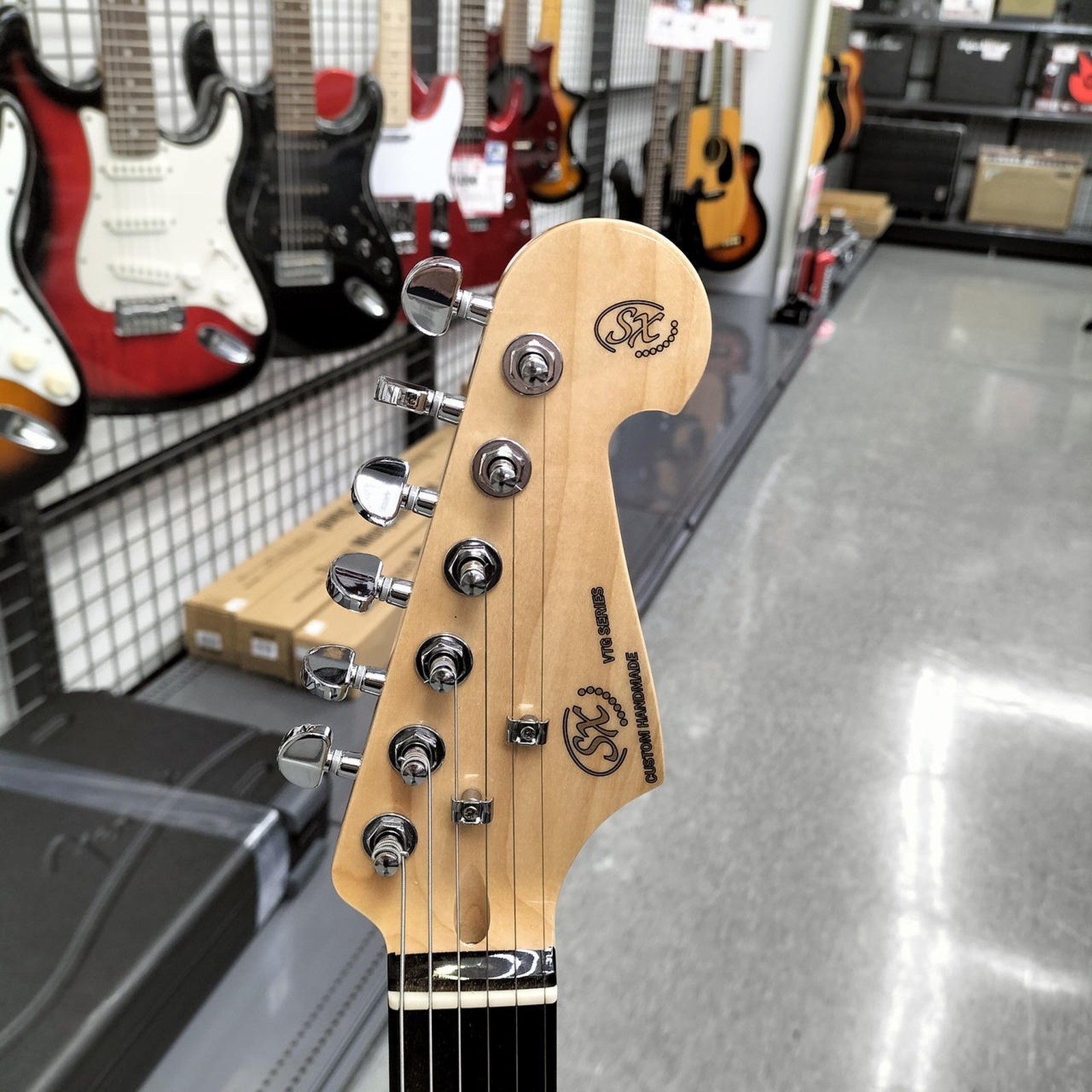 SX SST/ASH/R/NA Used Ash body Maple neck Rosewood fingerboard Natural w/Softcase