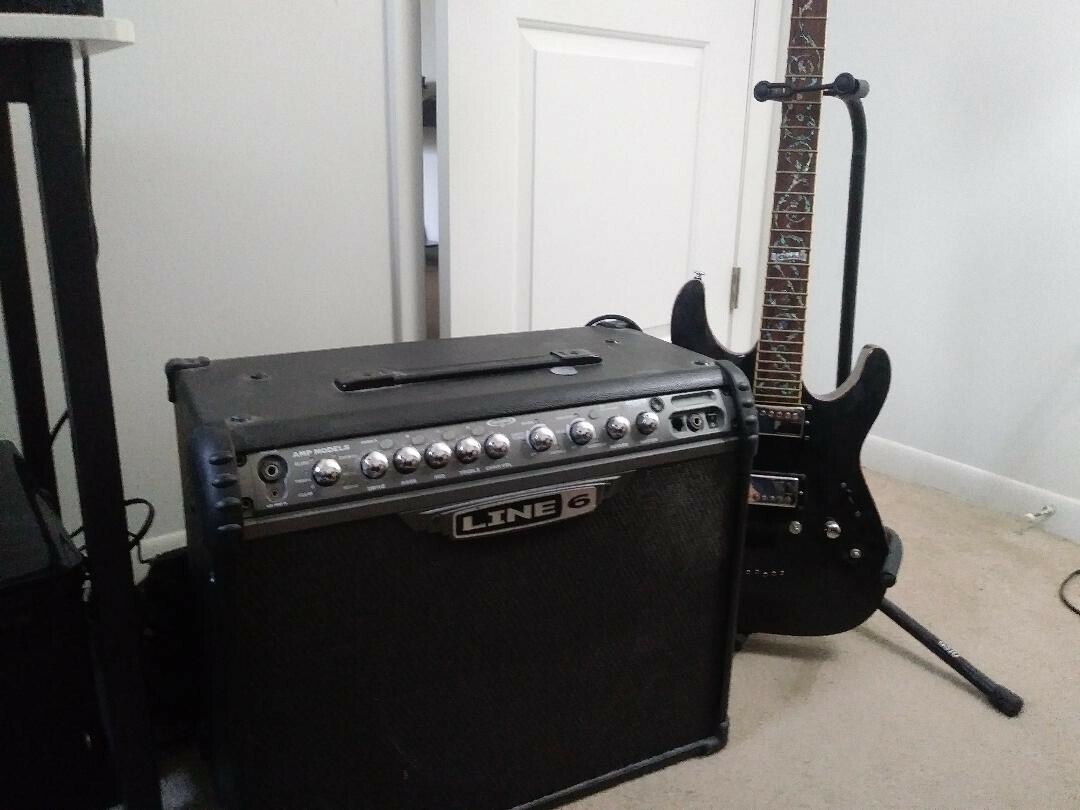 Schecter Diamond series electric guitar and Line 6 amp