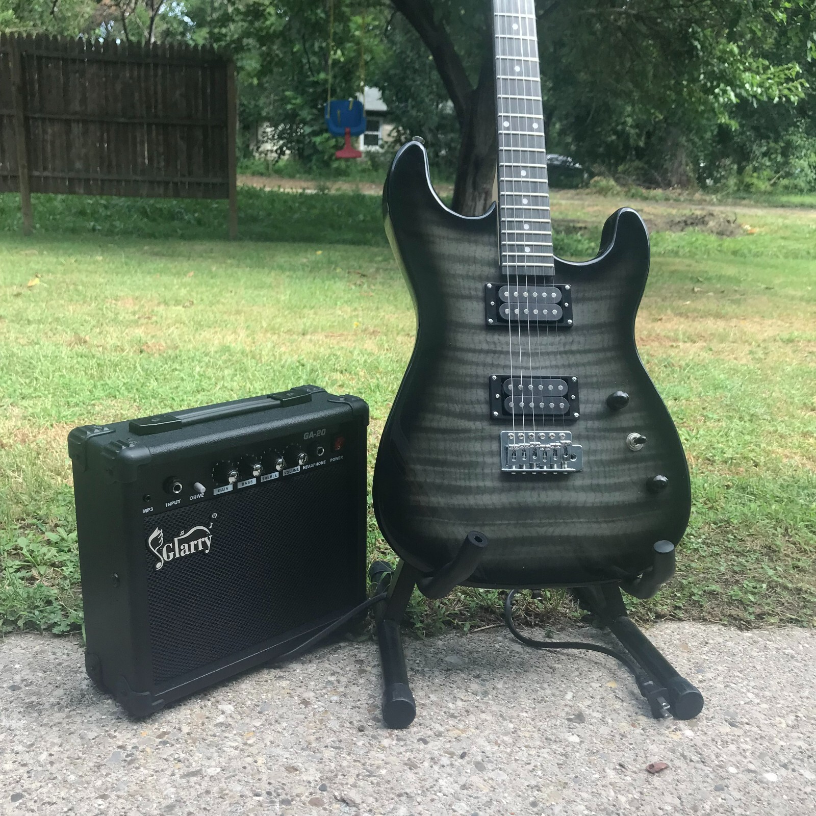 Black Electric Guitar Starter Package with Flamed Veneer Top 20-Watt Amp & More