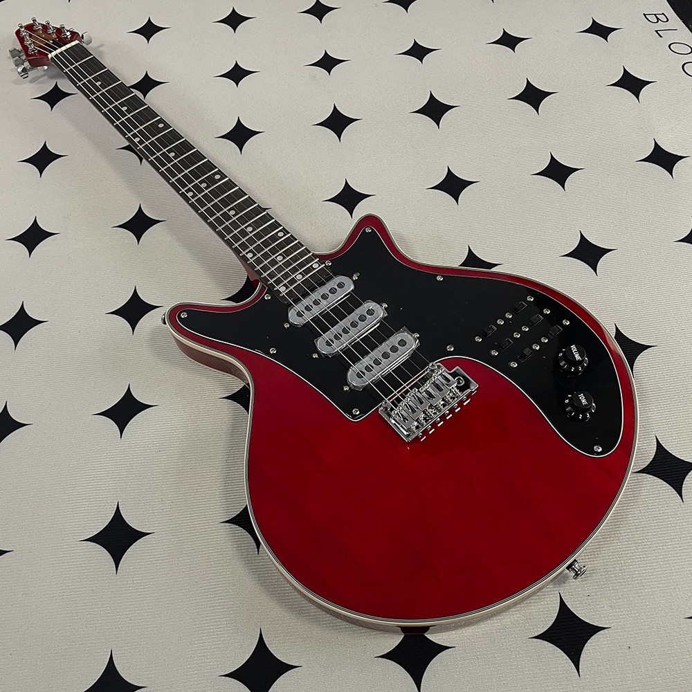 High-quality electric guitar; mahogany body and neck; stainless steel frets