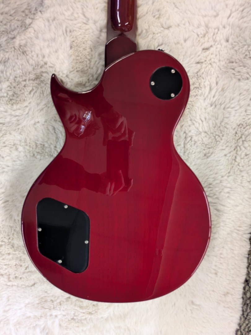 Vintage V100TWR Reissued Single Cutaway Electric Guitar Flame Wine Red – B-Stock