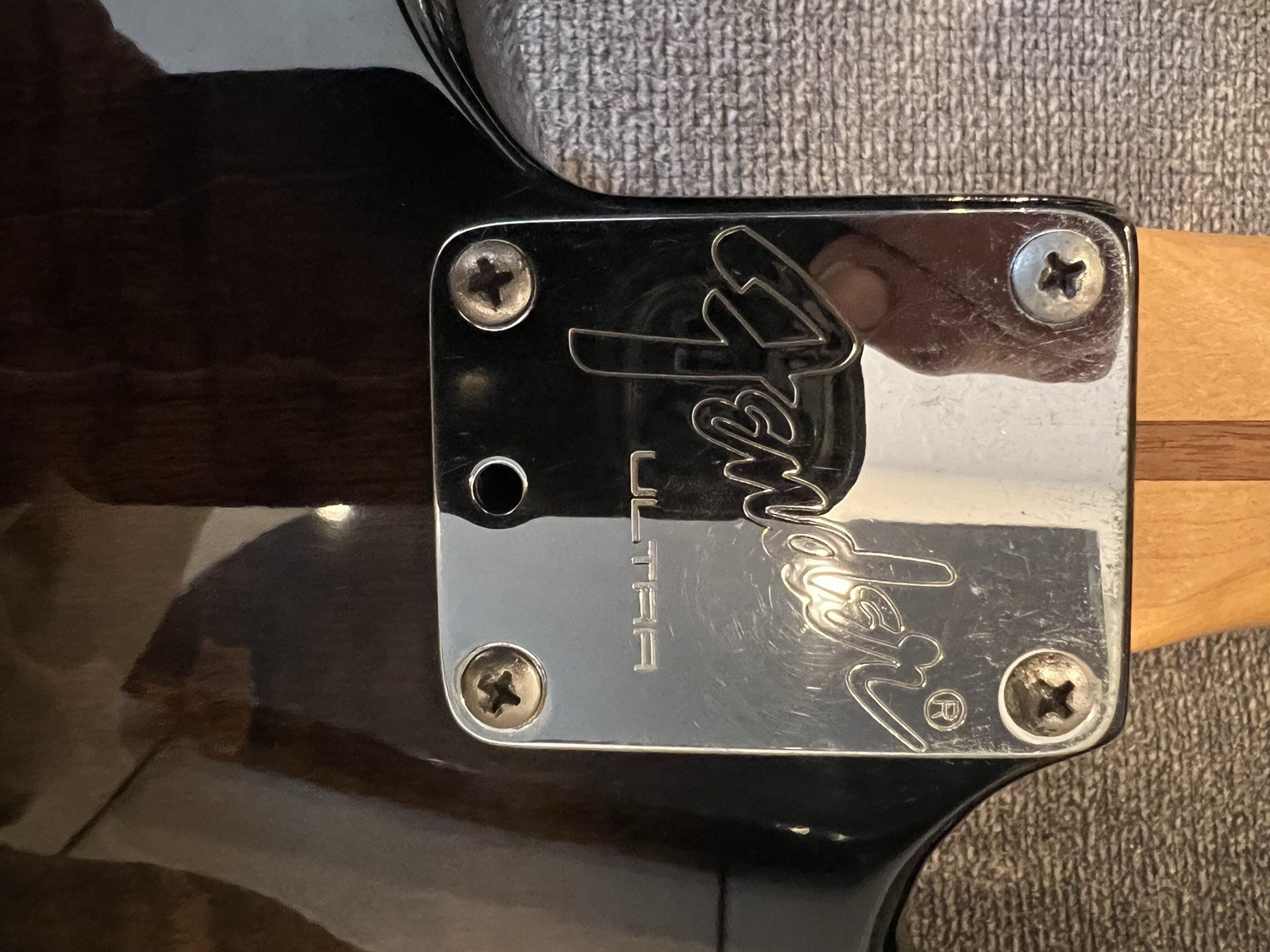 1990 Fender Strat Ultra transparent black over a figured flamed maple top