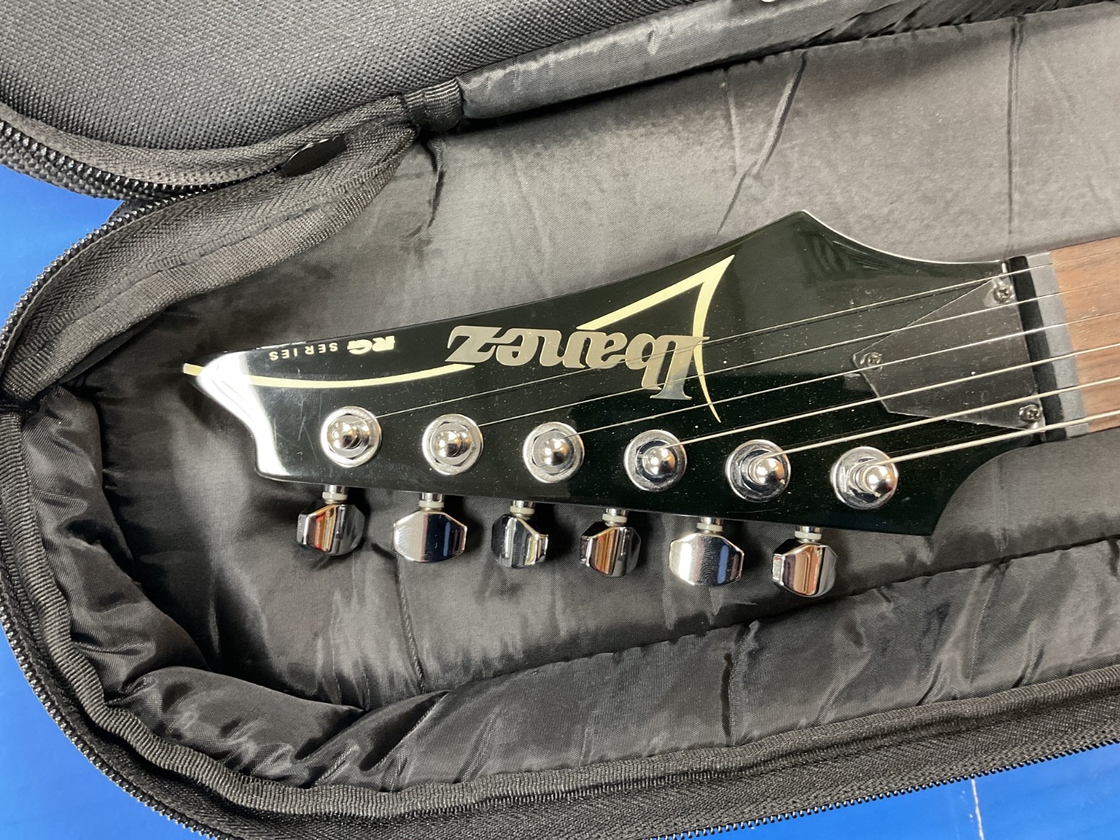 Ibanez RG120 black electric guitar w/ road runner gig bag