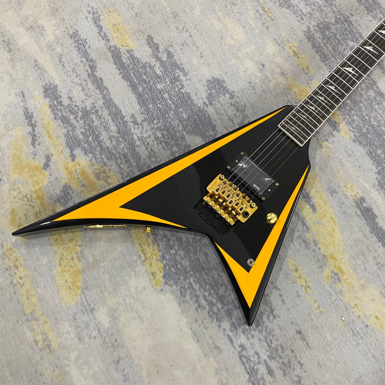 Striking Black Yellow Stripe V Style Electric Guitar Gold Hardware Mahogany Body