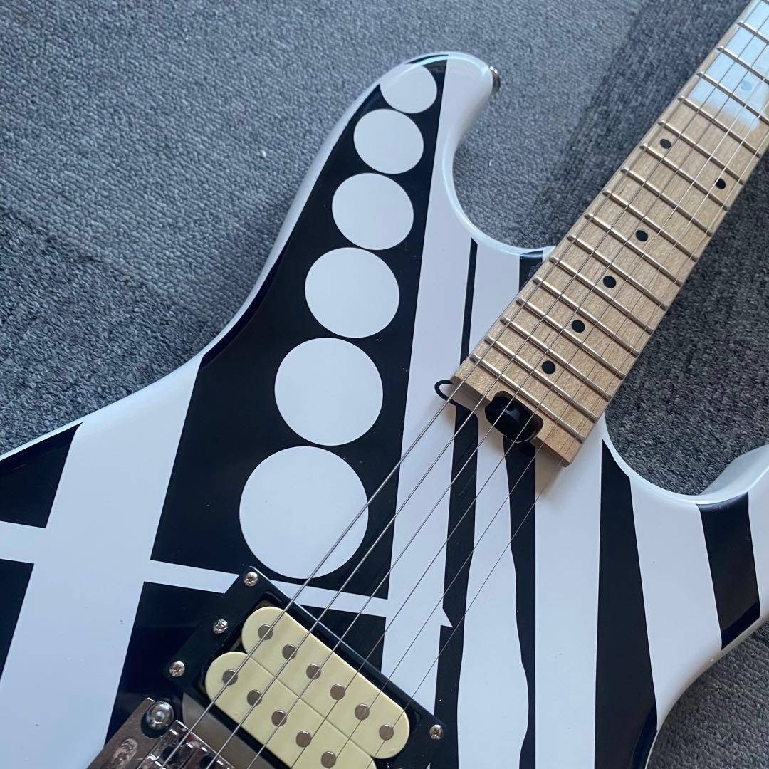 Electric guitar white and black stripe design black and white no brand