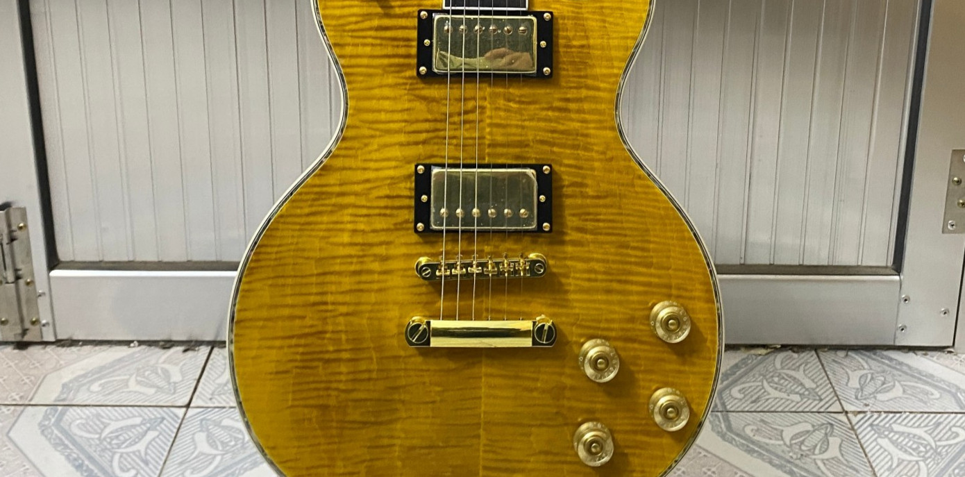 Luxurious Flame Maple Veneer Electric guitar Gold hardware multicolour Binding