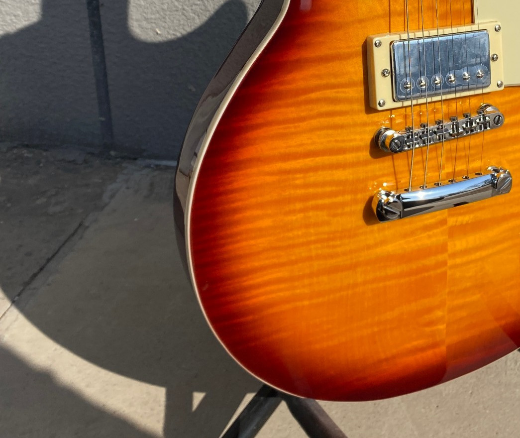 Brown 6-string electric guitar, flame maple top, fast shipping from the US