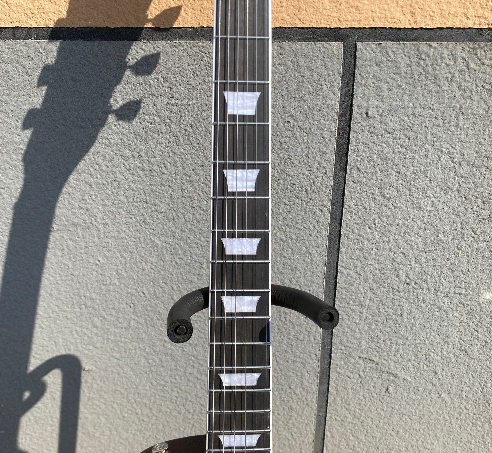 Brown 6-string electric guitar, flame maple top, fast shipping from the US