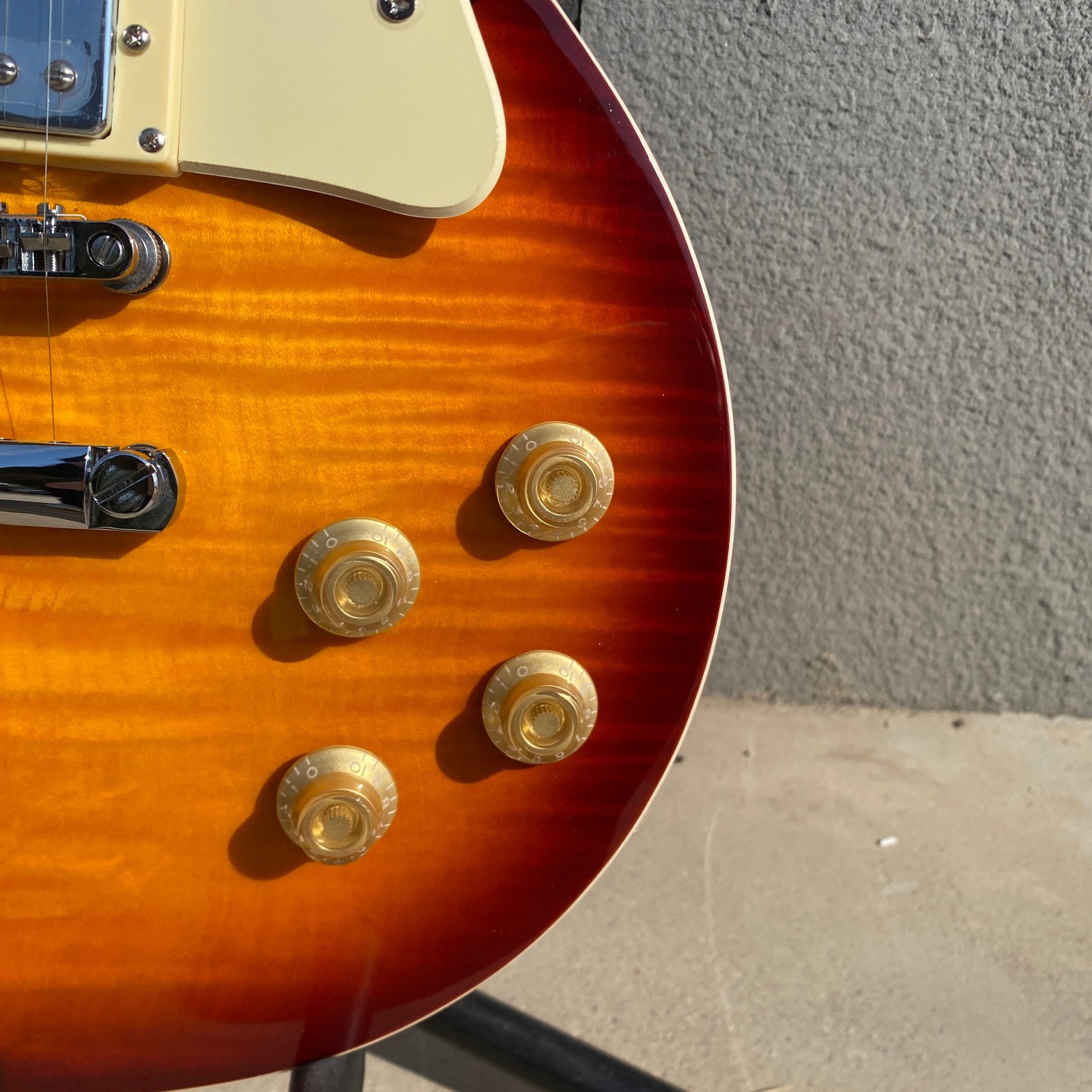 Brown 6-string electric guitar, flame maple top, fast shipping from the US