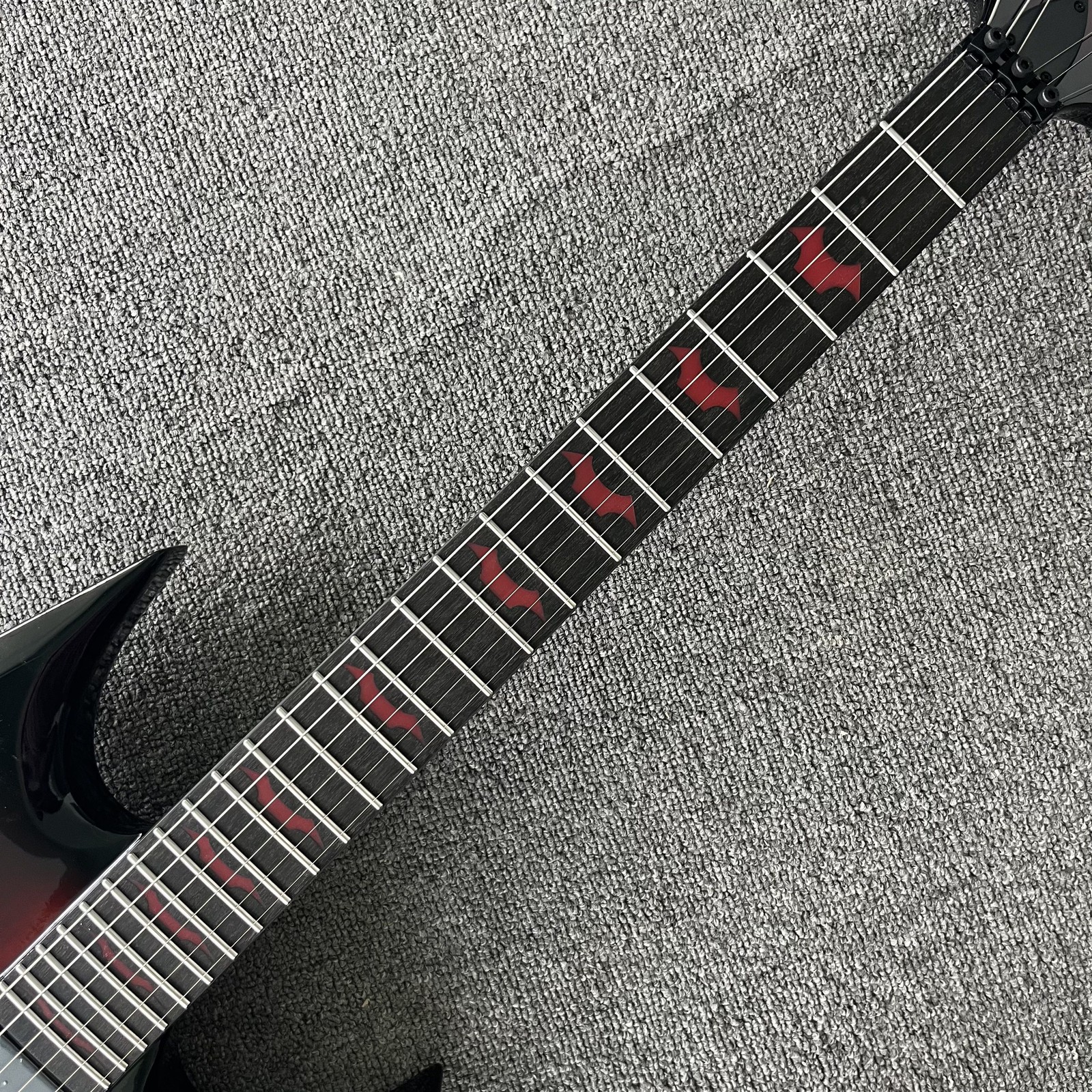 Flamed Red&black Warlock Shape Solid body Electric Guitar HH pickup FR fast ship
