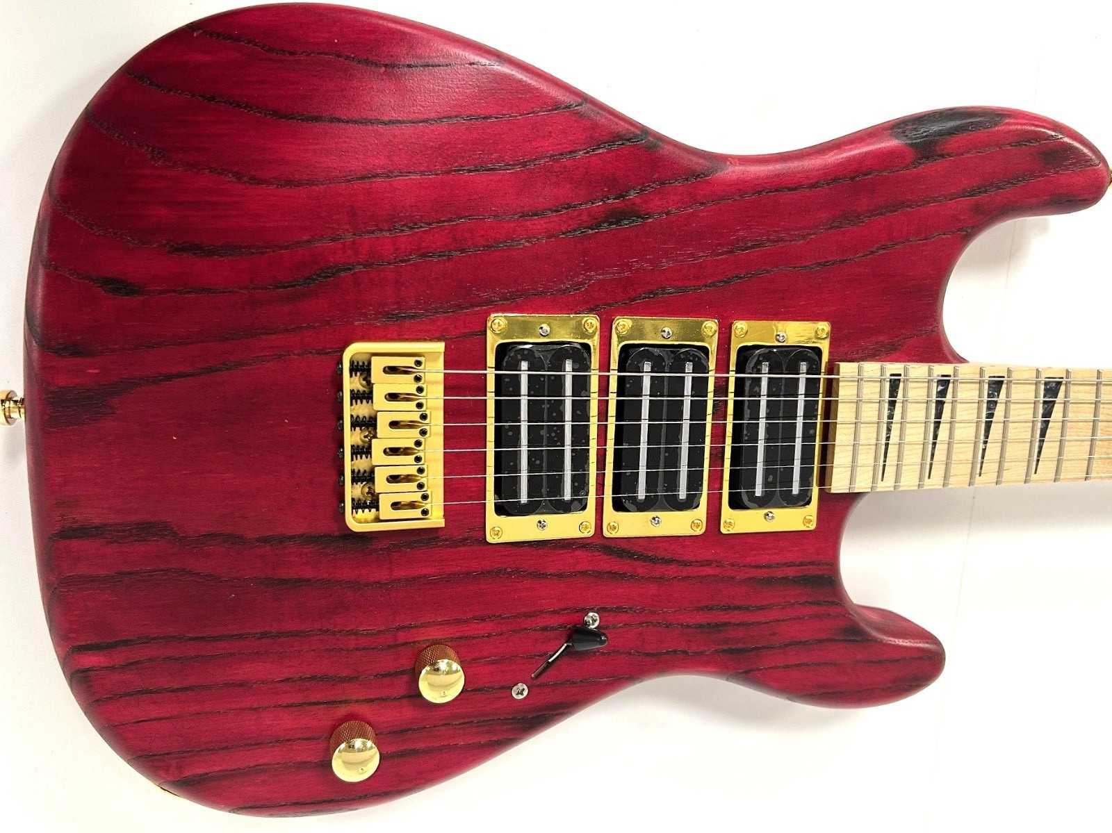 Triple threat, custom red Strat style guitar, 3HB blades, hipshot style bridge