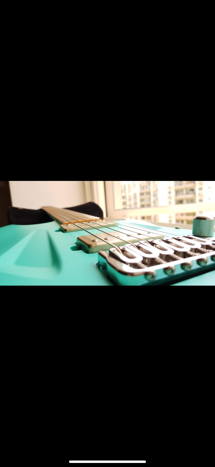 Aristides 060 Electric Guitar in Aqua Green Matte Pearl