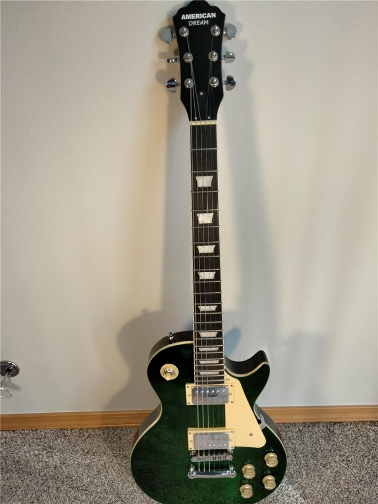 NEW AMERICAN DREAM ELECTRIC GUITAR with a $170.00 hard case