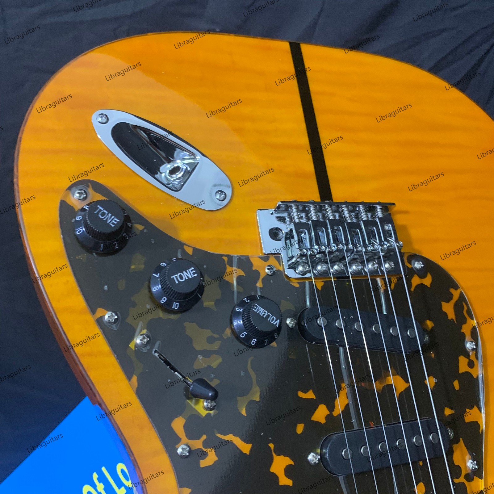 New Electric Guitar Figured Maple Top Veneer Tremolo Bridge SSS Pickups Yellow